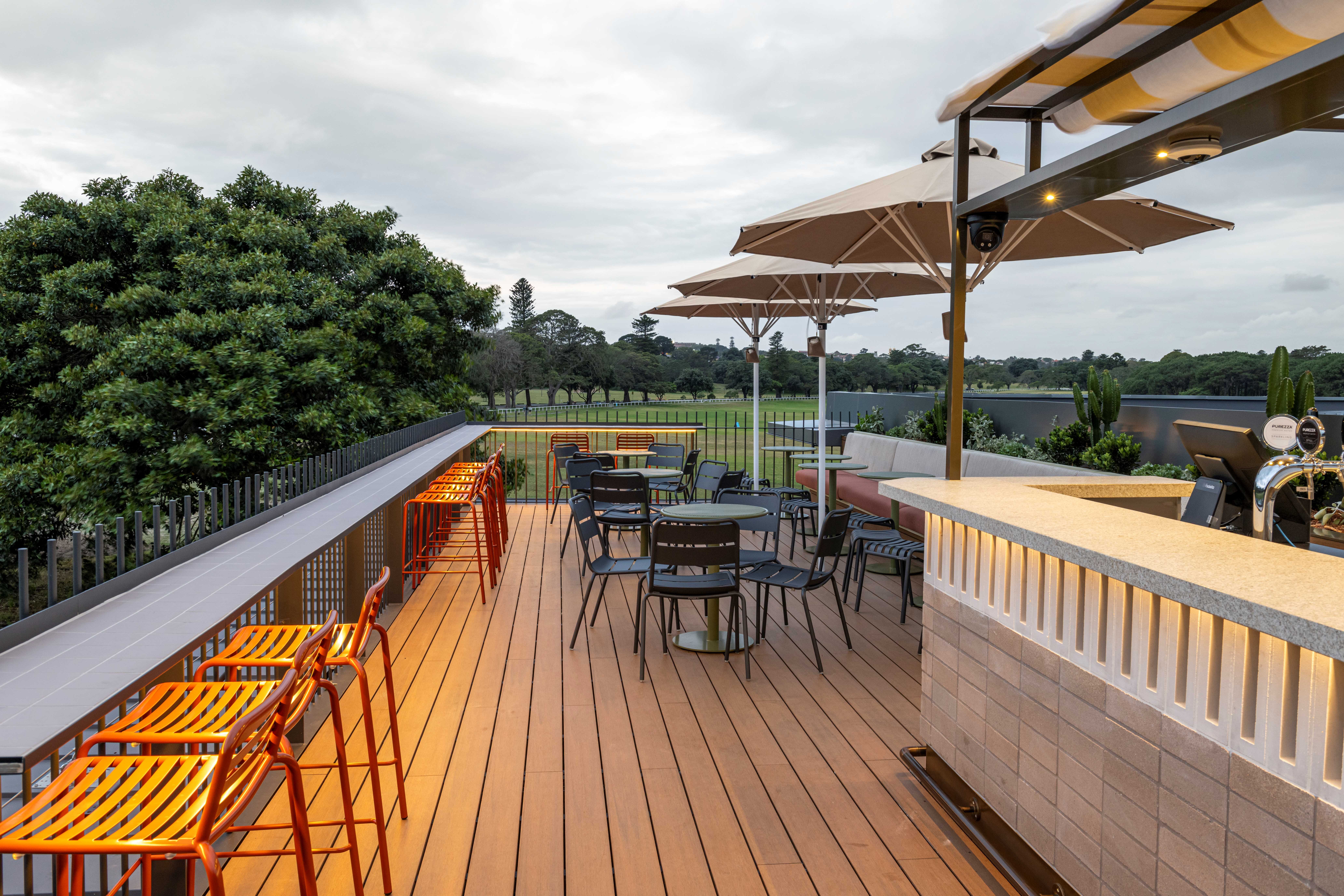 The Paddock with lawn and Treehouse rooftop bar 5